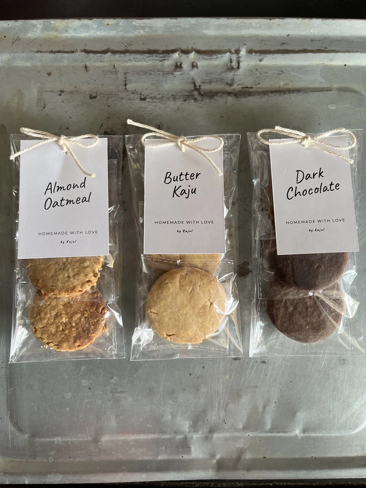 Homemade cookies packaged with handwritten tags, by Kajal